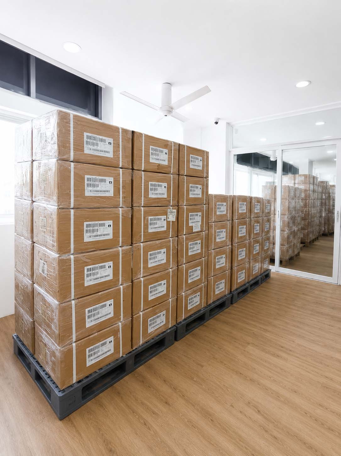 Palletized, shrink-wrapped shipment boxes ready for export, representing Getmeds Healthcare's global sourcing network