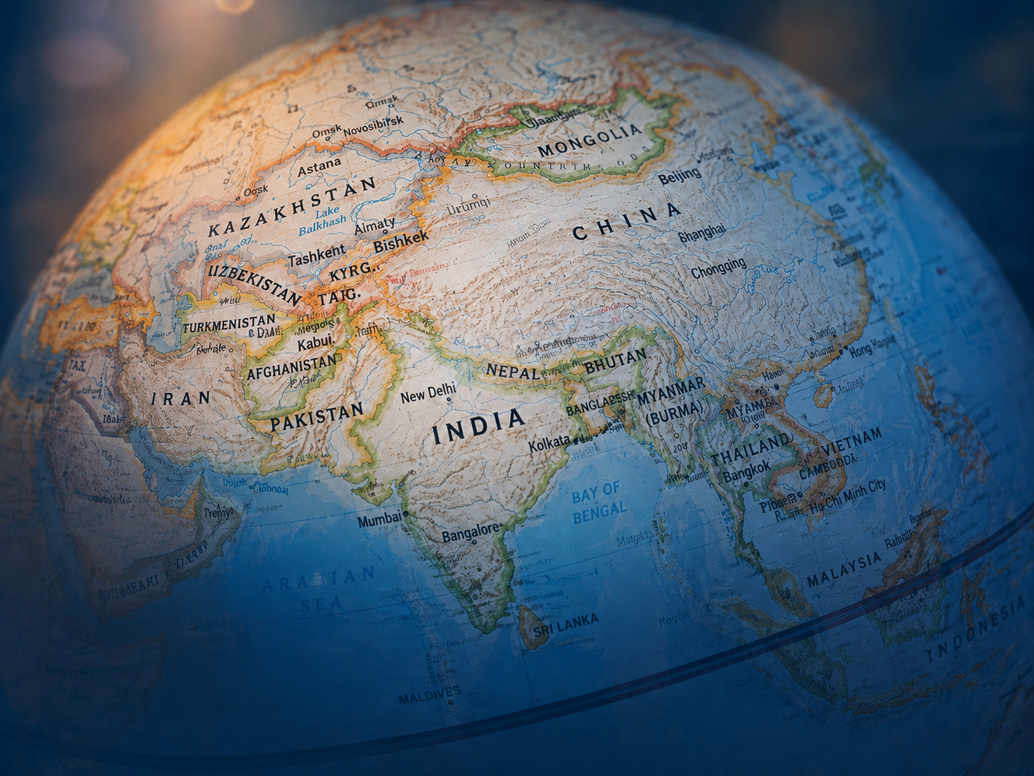 Close-up of a world globe showing India, China, and the surrounding region, representing Getmeds Healthcare's global sourcing network